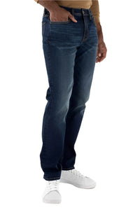 Model Wearing Devil Dog Athletic Fit Jeans in Taylorsville color, side view