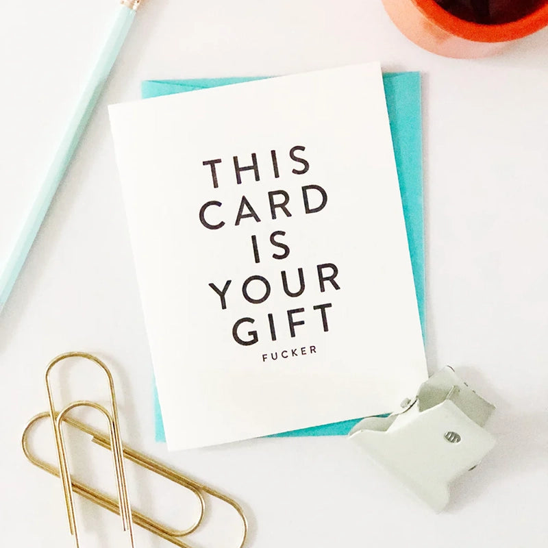 This Card is your gift - Birthday card, front shown stylized on a desk with paperclips