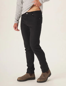 Model wearing The Normal Brand Comfort Terry Pants in Black, Front view