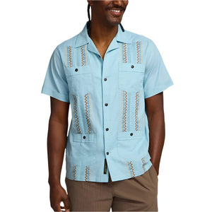 Model wearing Howler Brothers Guayabera Shirt in Nile blue, front  view