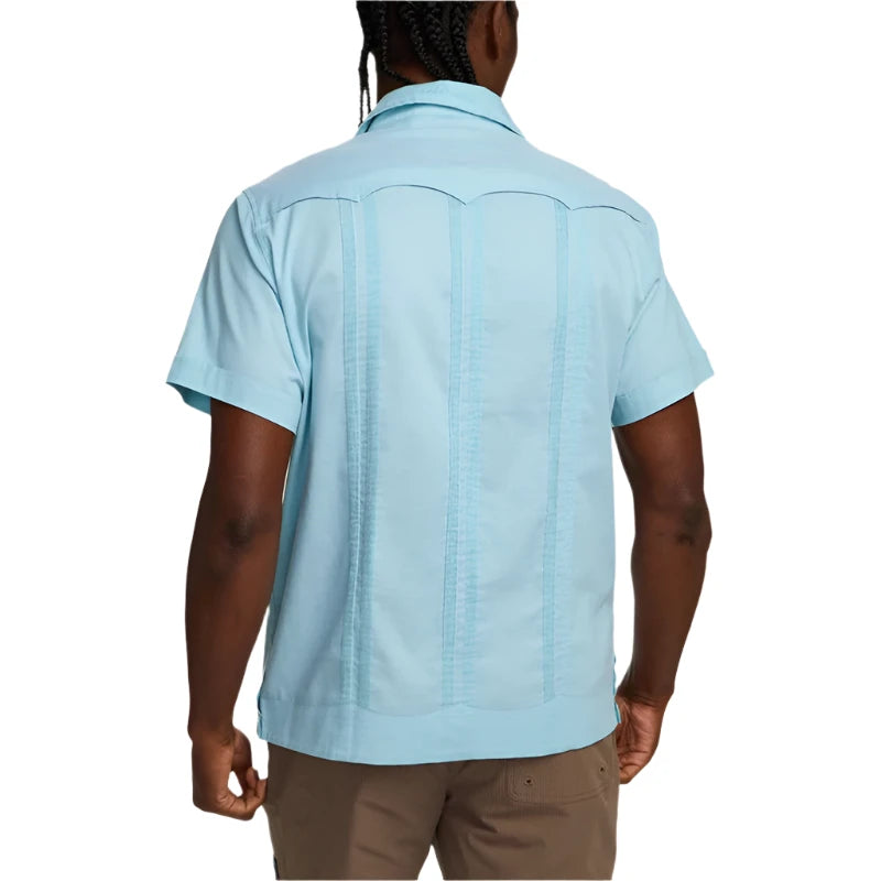 Model Wearing Howler Brothers Guayabera Shirt in Nile blue, rear  view