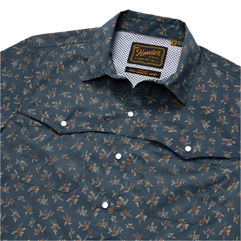 Howler Brothr's Open Country Tech shirt in the Rancher floral - dark Slate option, flat lay close up  view