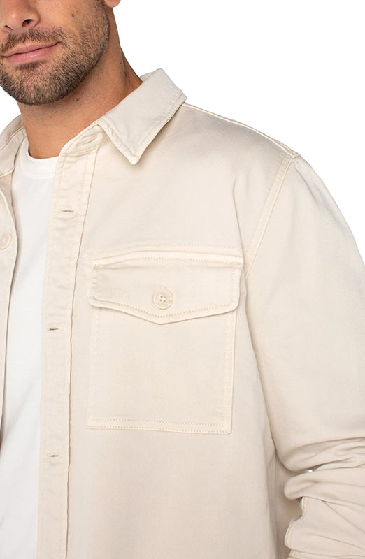 Model wearing Liverpool overshirt in parchment color, front  close up detail view