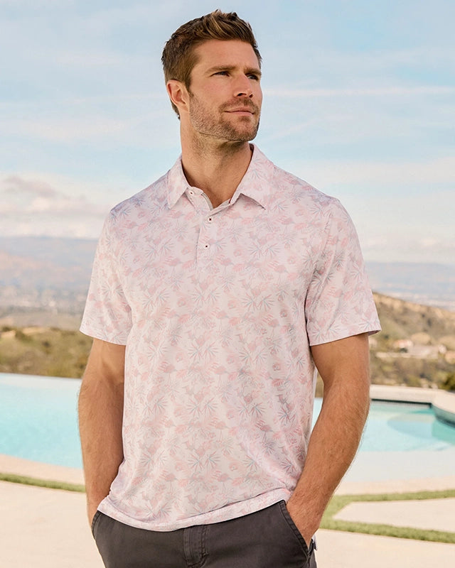 Model Wearing Flag & Anthem Pasadena Toucan Polo in white/coral color, front view