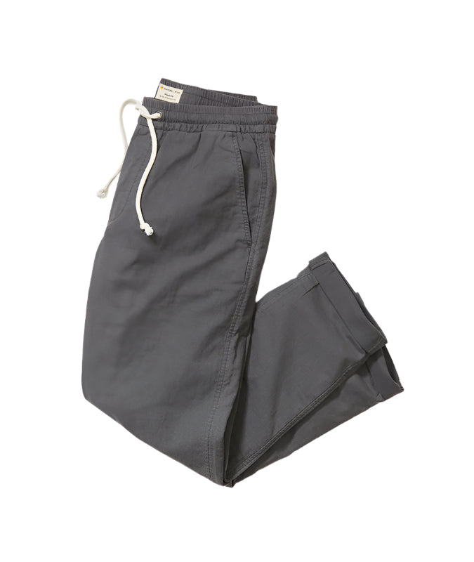 Marine Layer Saturday Stretch Pant in black, flat lay view