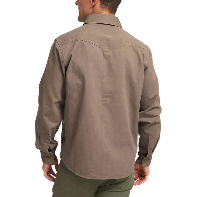 Model Wearing Howler Brothers Sawhorse work shirt in taupe, rear view