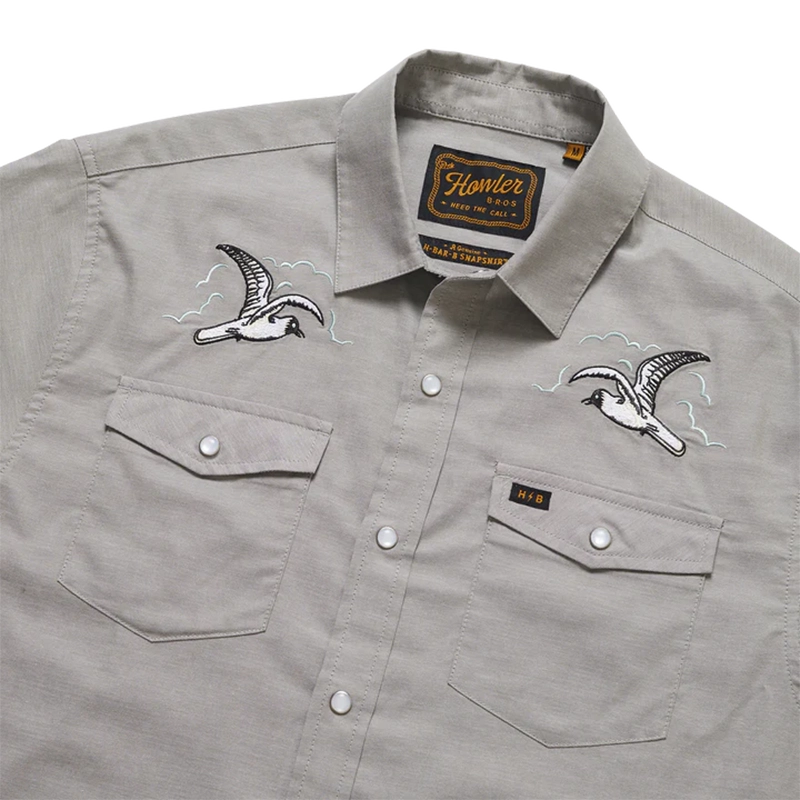 Howler Brothers H bar B snapshirt with limited edition, dealer exclusive seagulls design on a grey shirt, close up detail view