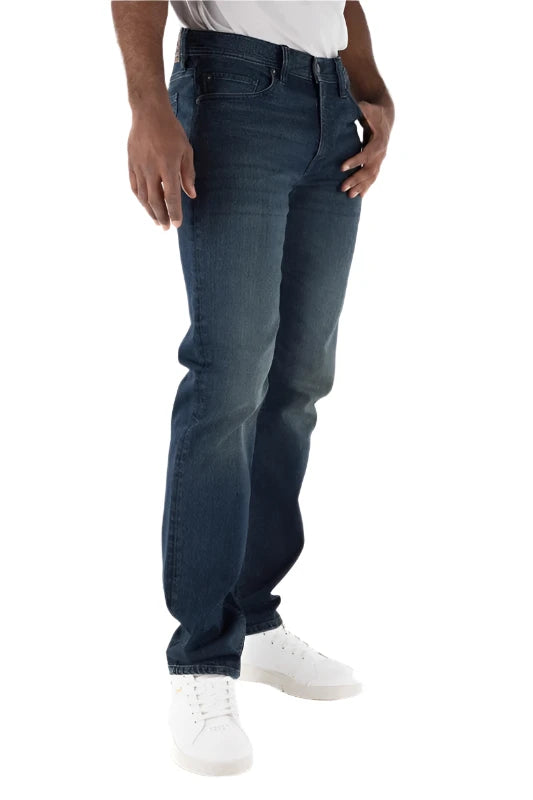 Model Wearing Devile Dog Slim Straight Jeans. in Benson Color, side view