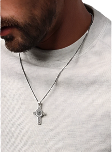 Model wearing St. Michael Cross pendant Necklace.