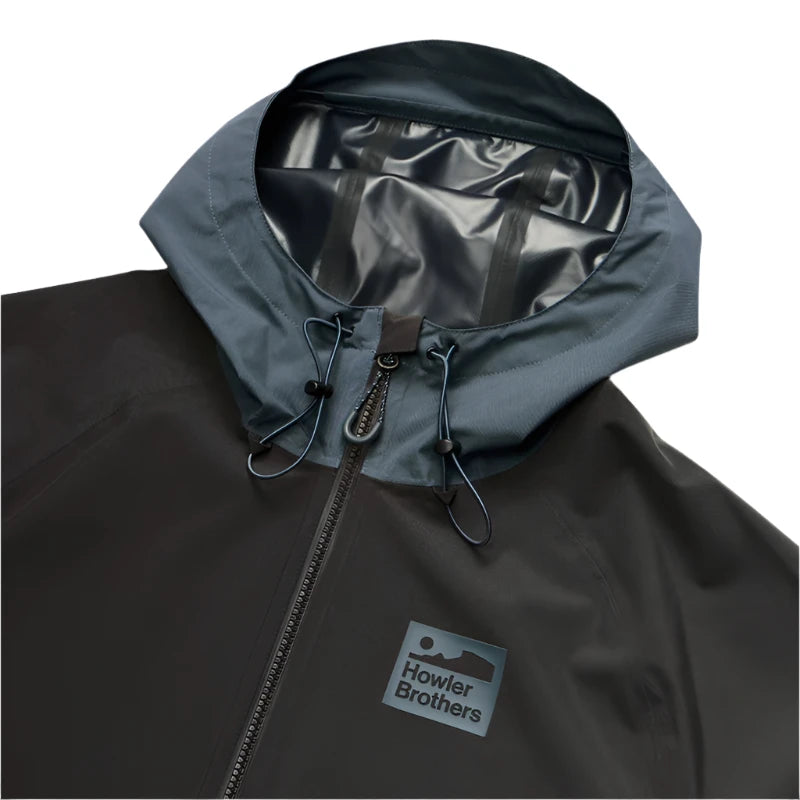 Howler Bros. Storm Splitter Rain Shell jacket, in antique Black and Slate color, flat lay close up detail view