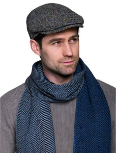 Model Wearing Trinity Flat cap in grey Herringbone tweed