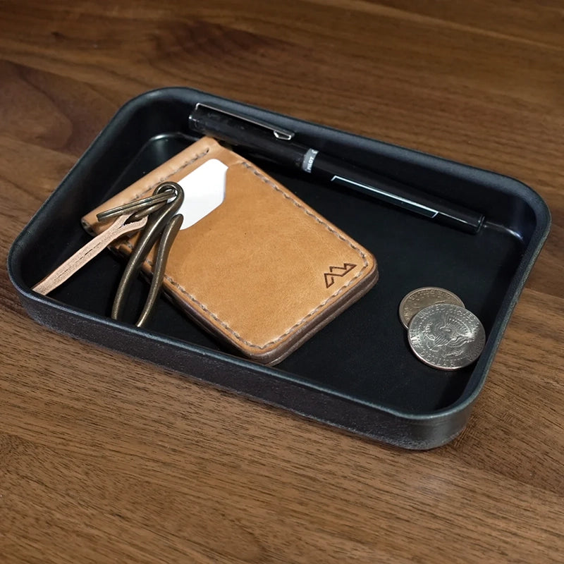 Range Leather Valet Tray in Black, shown with keys and a wallet inside