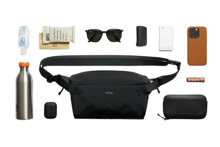 Bellroy lite sling in black showing contents that are capable of fitting inside