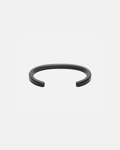 Craighill Radial cuff Bracelet in Black, with bracelet shown lying on its' side