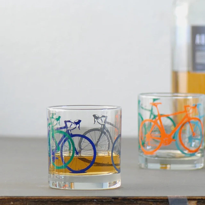 11oz rocks glass screen printed with multi colored bikes